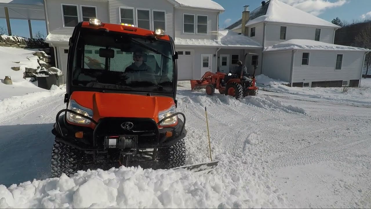 Snowplowing with a Kubota RTV and snowmobiling