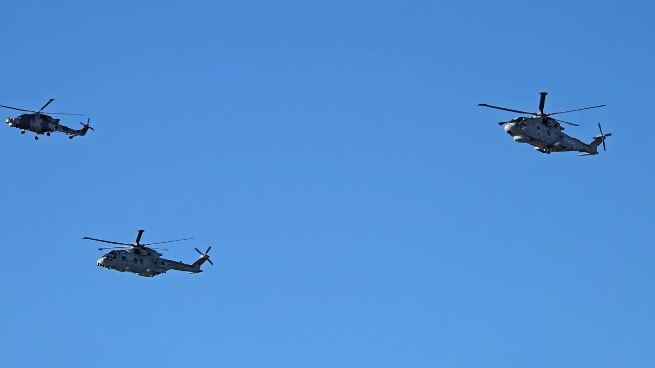 Flypast by two Royal Navy  Merlin and one Wildcat helicopters  CSG25 