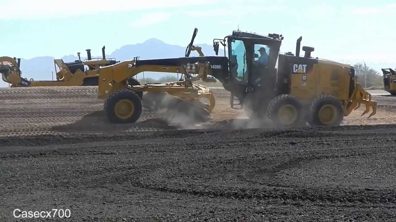 CAT 140M2 Grader Demonstrating Sidecasting
