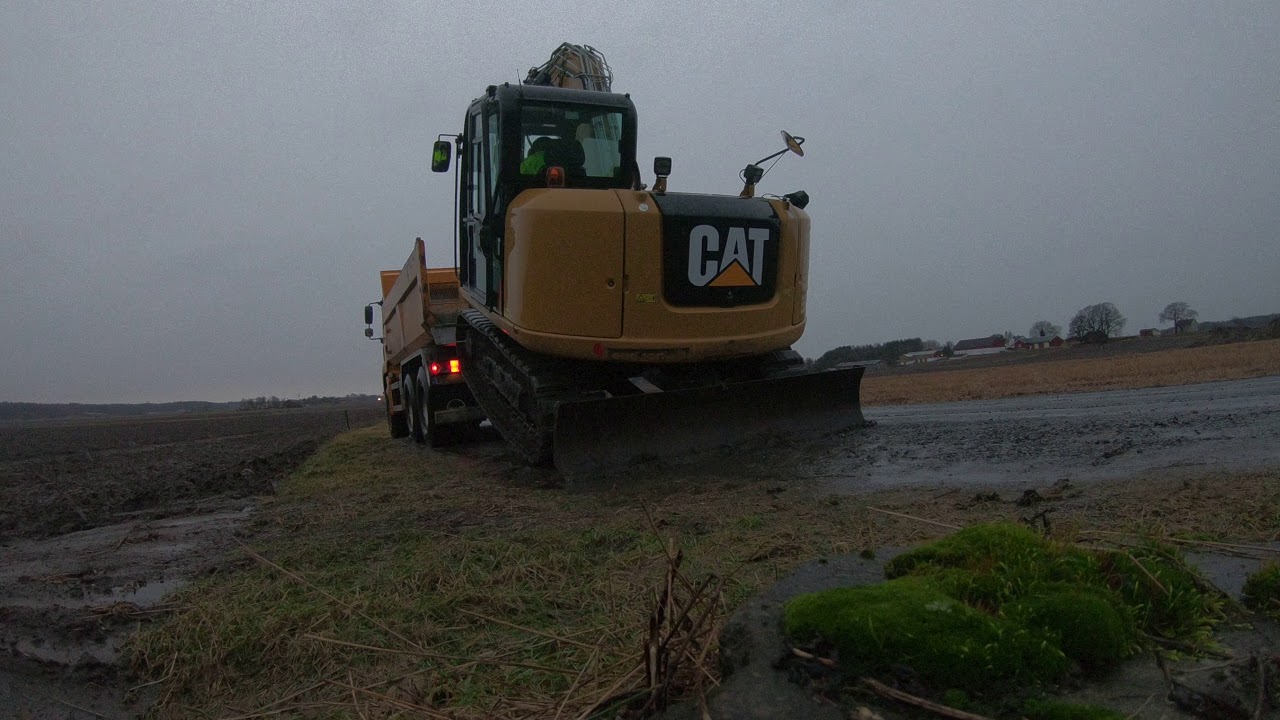 Cat 307E2. Truck downclimb..