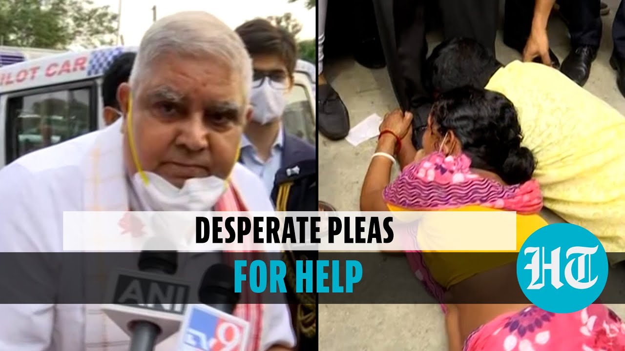 Watch: Violence victims fall at feet of WB Governor as he visits Assam camp
