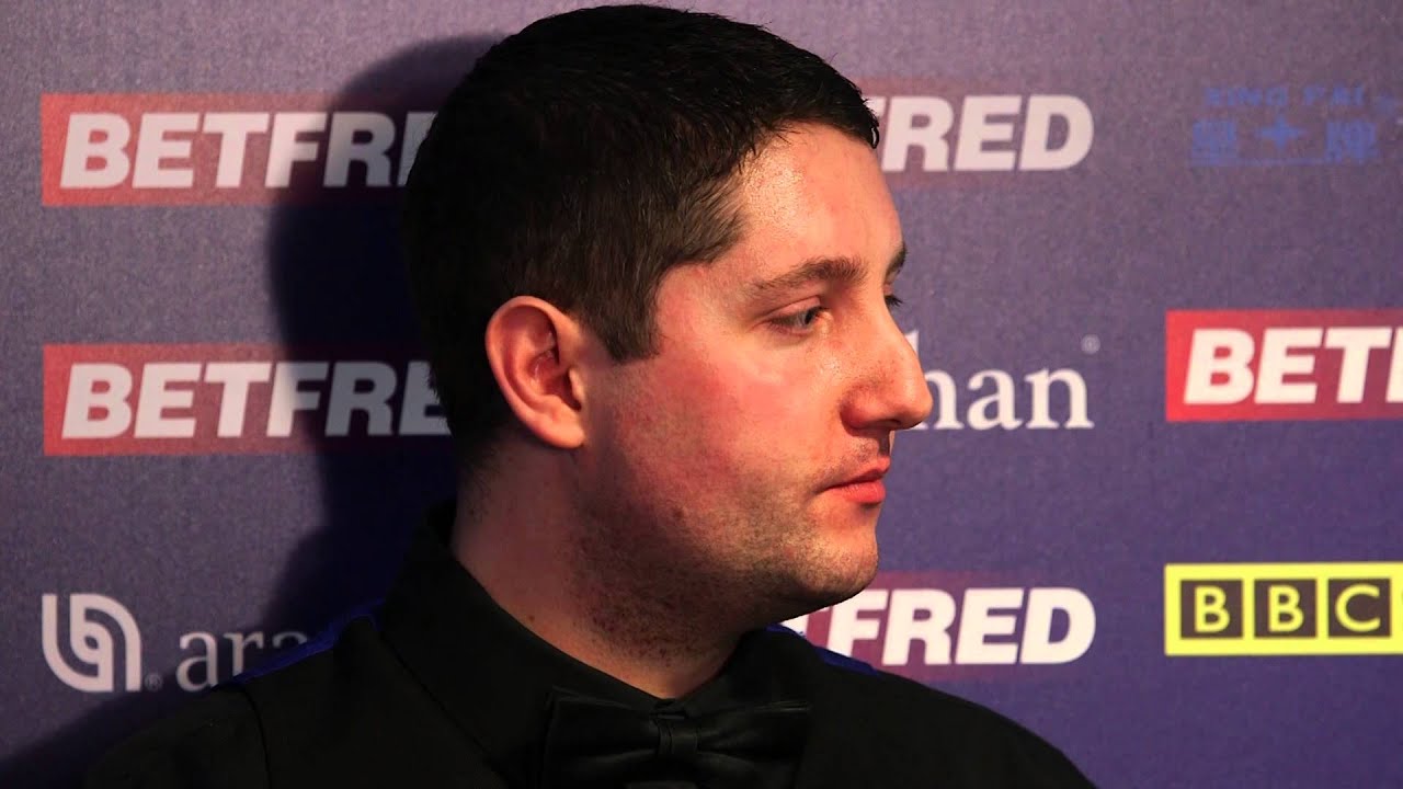 Stuart Carrington loses to Judd Trump at the Betfred World Snooker Championship