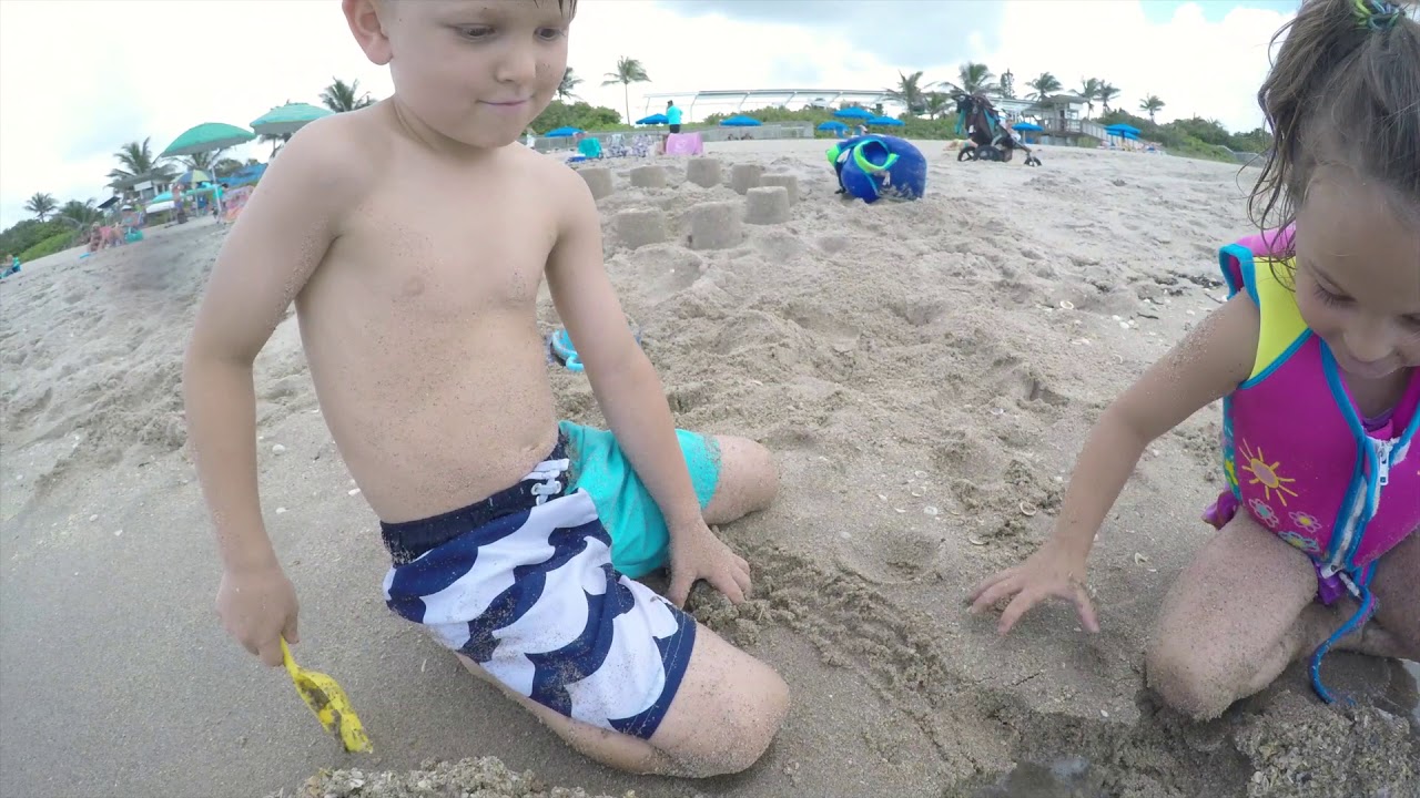 Joseph and Savannah building sand castles and swimming at Boynton Beach June 4 2018 - Share the Life