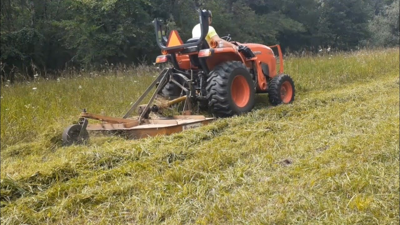 Brush hogging our pastures with the L3301 and a 5ft brush hog.