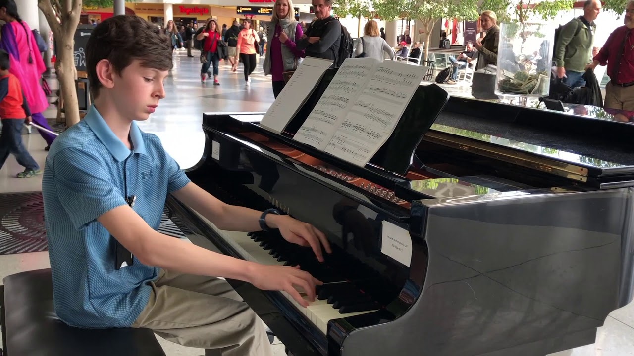 Rhapsody in Blue by George Gershwin, performed by 13-year-old pianist, Evan Brezicki.