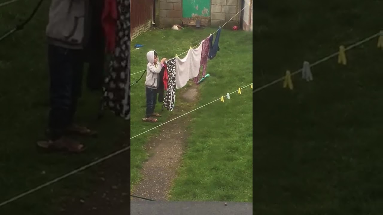7Y.O Gets Clothes In Heavy Rain
