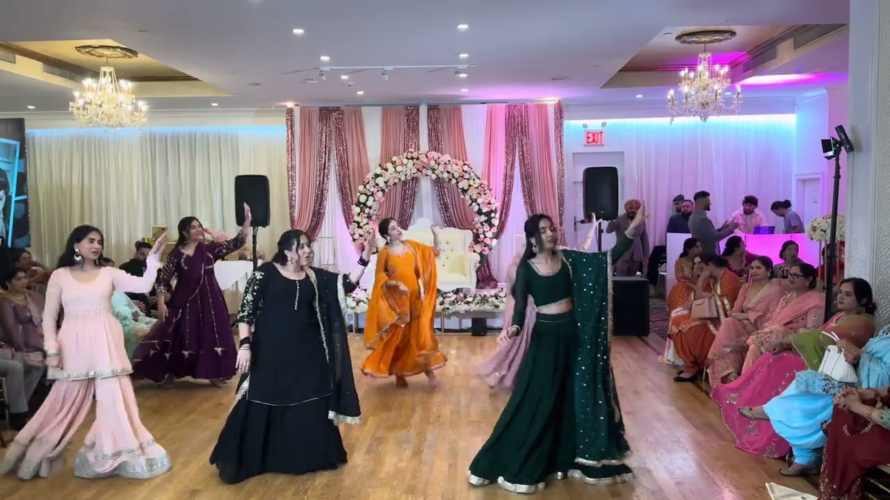 SURPRISE PUNJABI ENGAGEMENT DANCE PERFORMANCE BY BRIDE & SISTERS