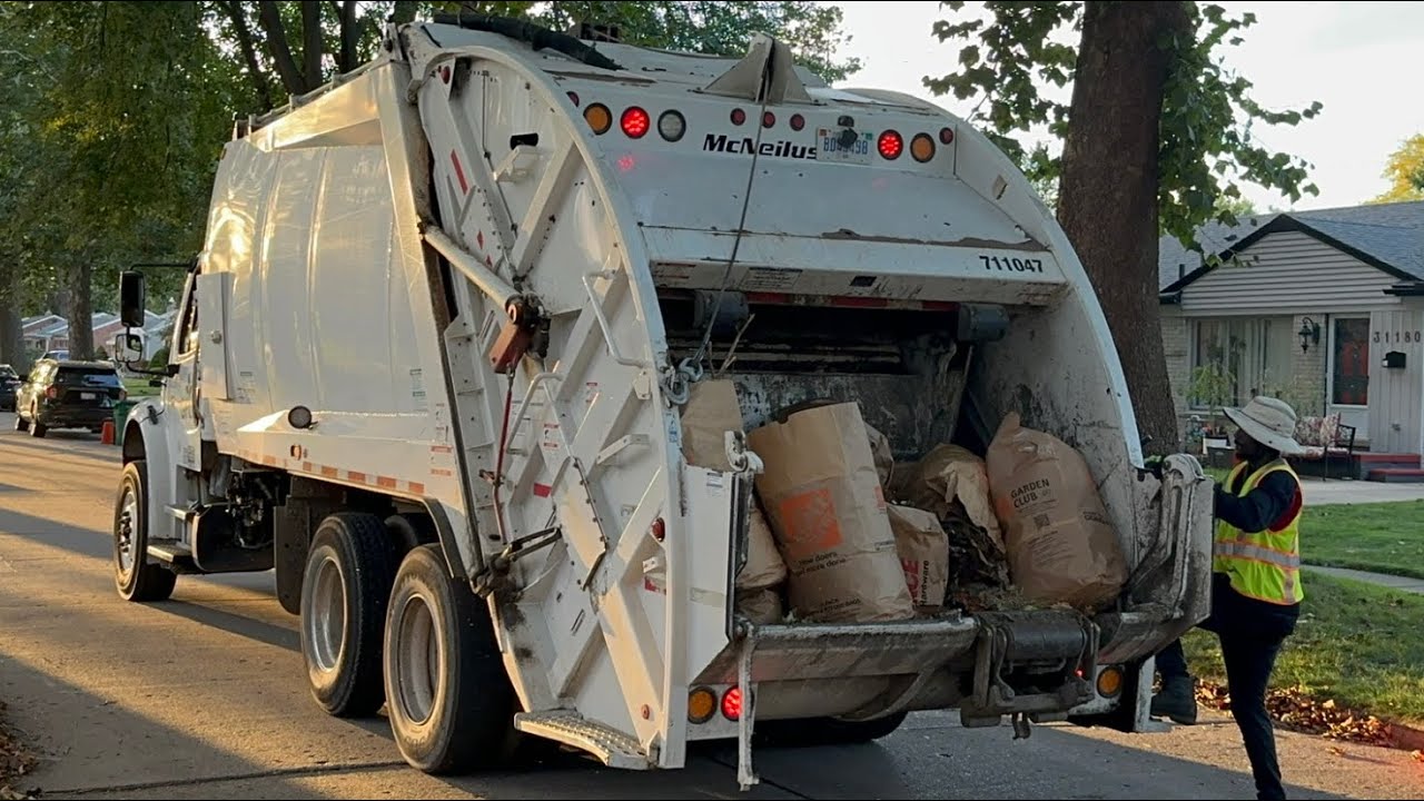 Priority Waste Rental Rear Loader Garbage Truck Packing Heavy Fall Yardwaste