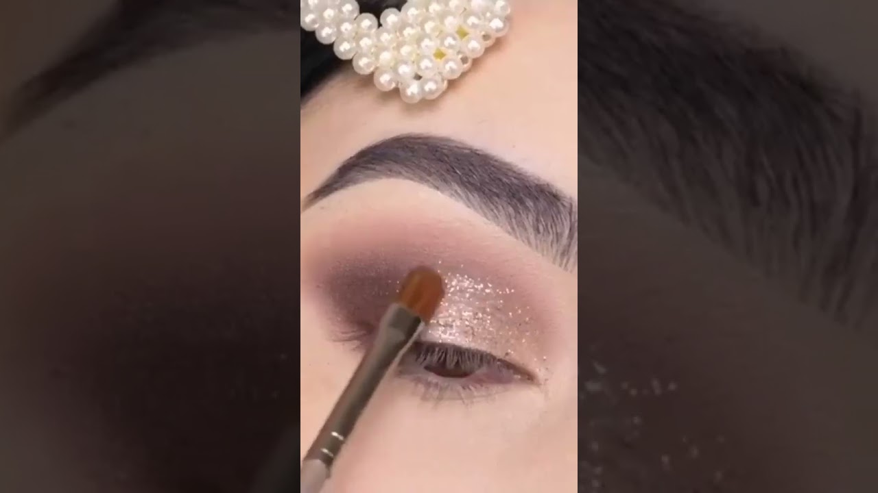 Shimmery eye makeup for wedding/reception.        