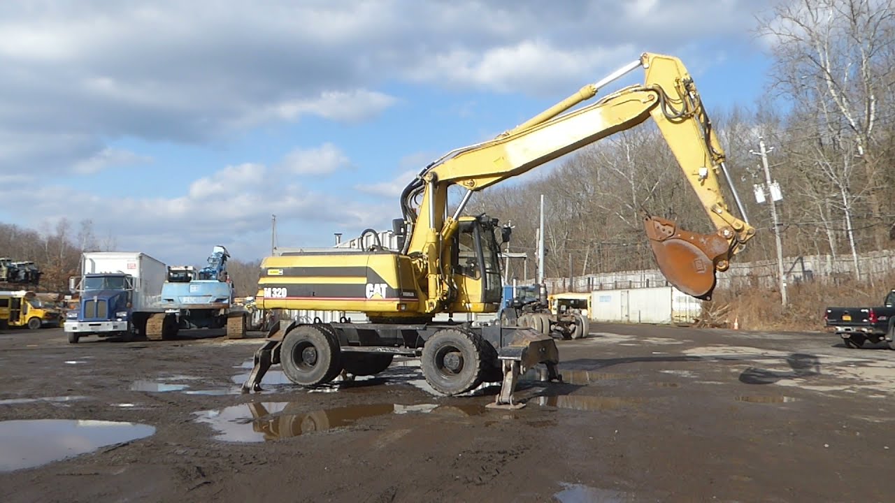 1999 Caterpillar M320 Wheeled Excavator - TRO 1115212