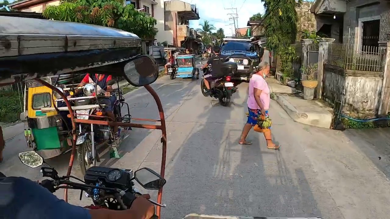 ride on in bakulung of our bike.(side cart) random ride in calauag