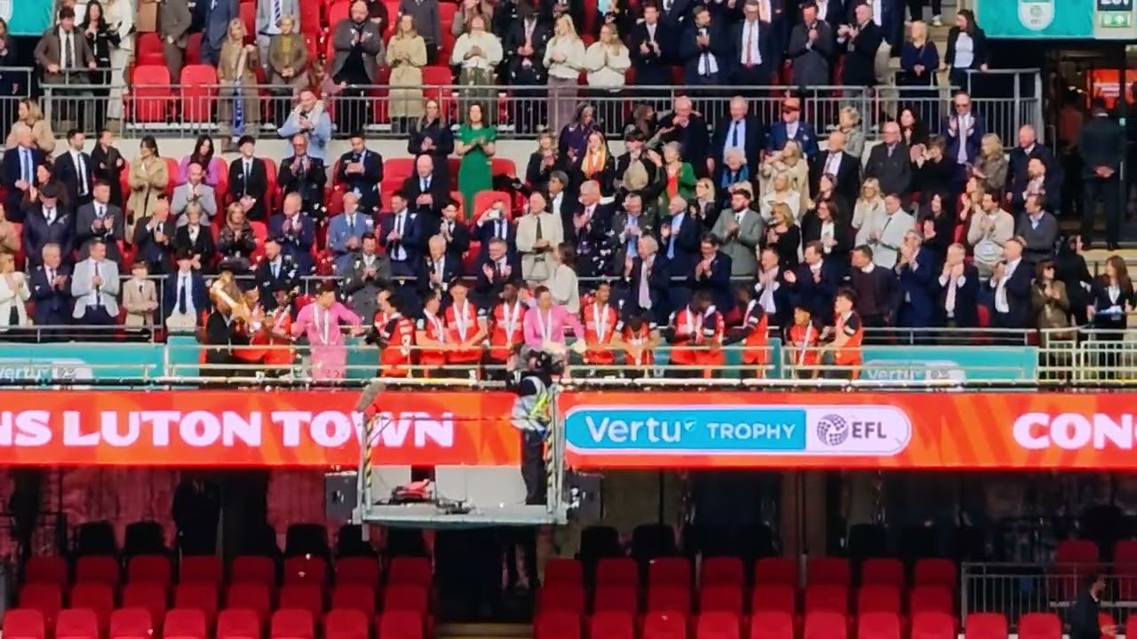 Luton lift the vertu cup trophy after a 3-1 win against Stockport County. COYH