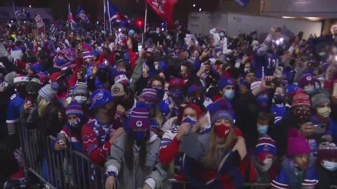 Bills return to Buffalo and greeted by hundreds of fans after clinching AFC East