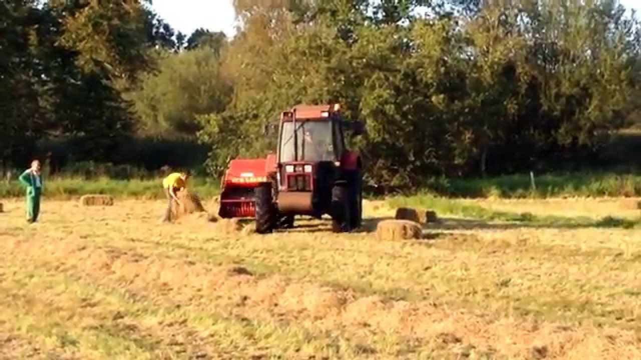 Case ih 845 xl baling and loading