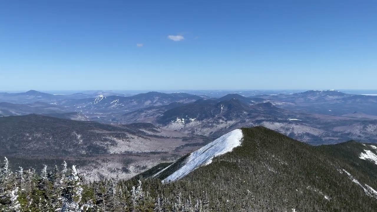 A winter panorama from the top of Mt Carrigain, in the White Mountains of New Hampshire.