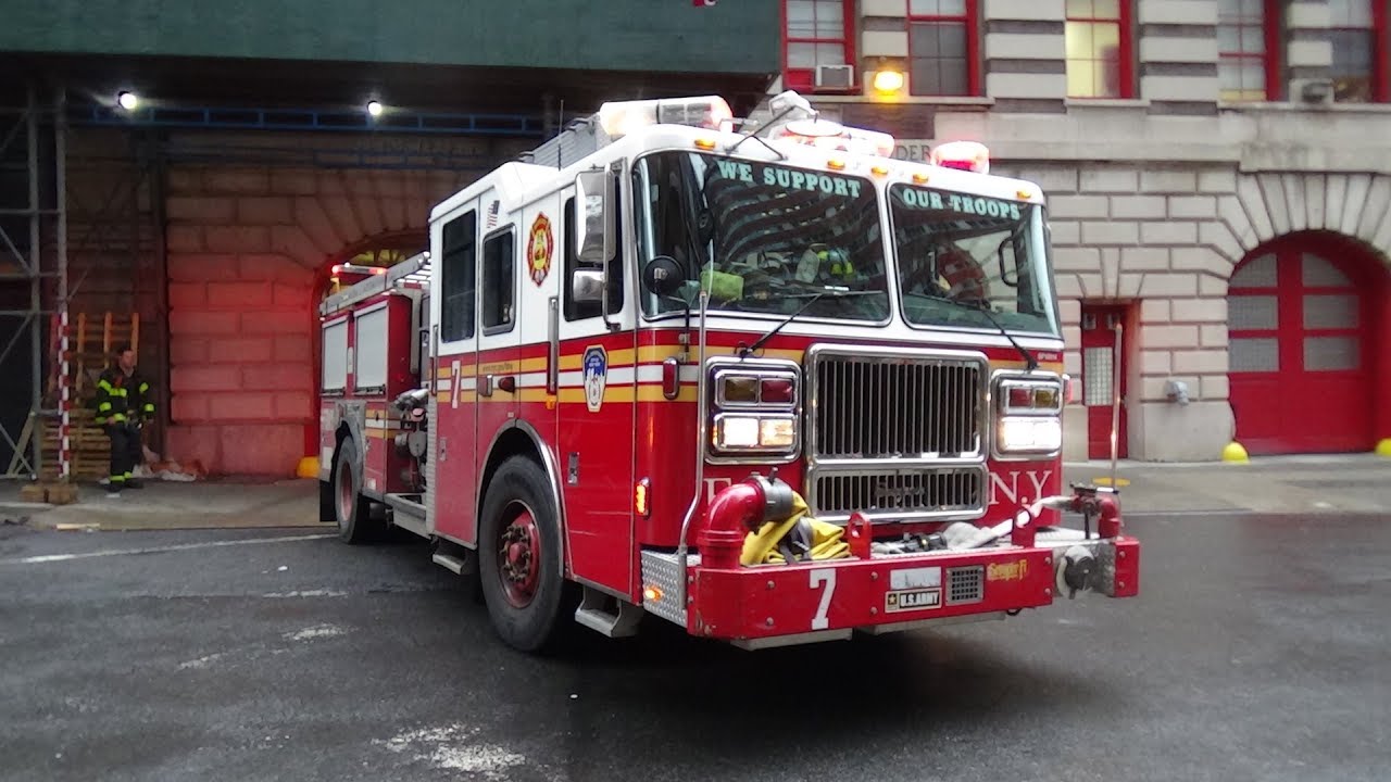FDNY Engine 7 and Tower Ladder 1 returning to their 