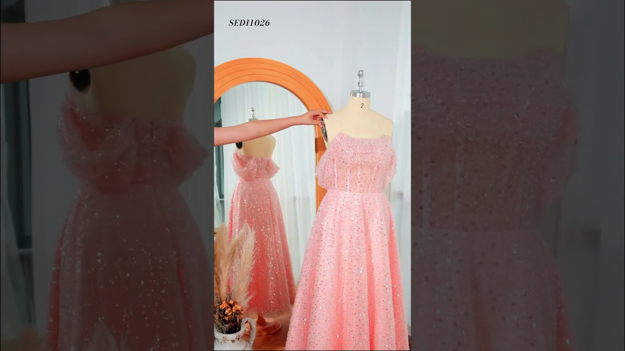 No cheap sparkle here&mdash;this evening dress has luminous sequins that moves with you all night.