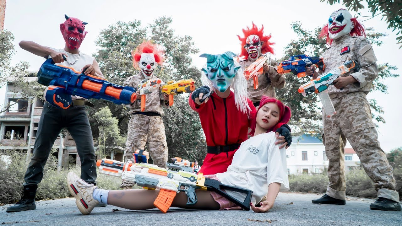 MASK Nerf War : Two Female Alpha Warriors Use Nerf Guns To Fight To Escape The RED DEMON Gang