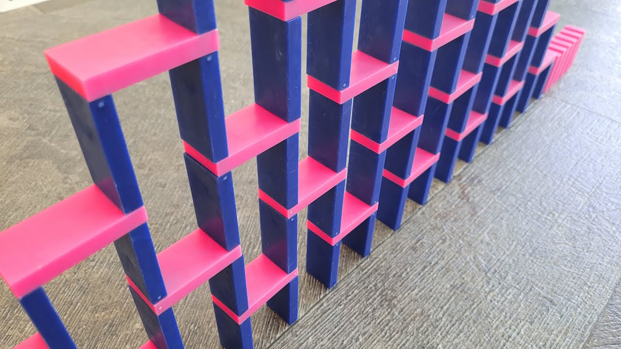 10 Domino Tricks in Slow-Motion! (pt. 2)