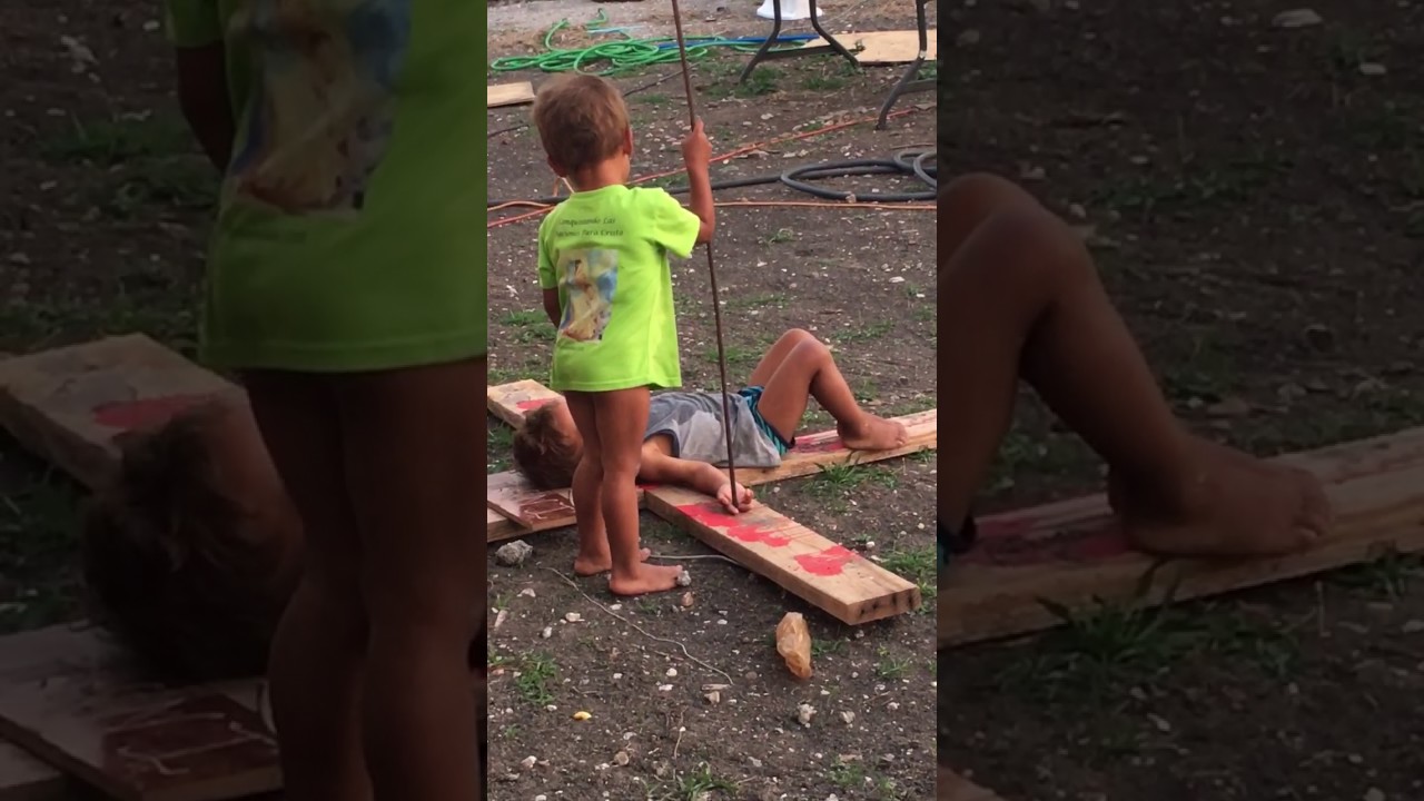Kids Pretending To Be Jesus On The Cross
