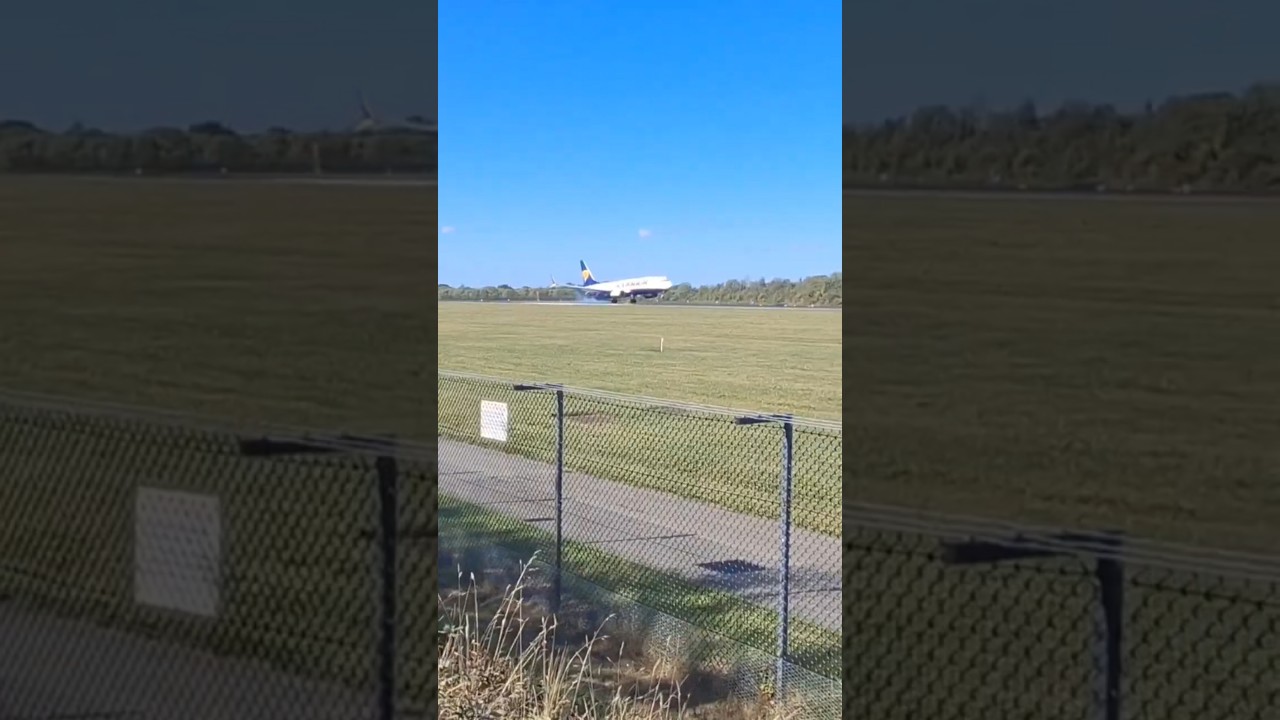 Tyre Smoke G-RUKH Boeing 737-8AS Ryanair - 05R Manchester Airport Arrivals Landing Runway 2