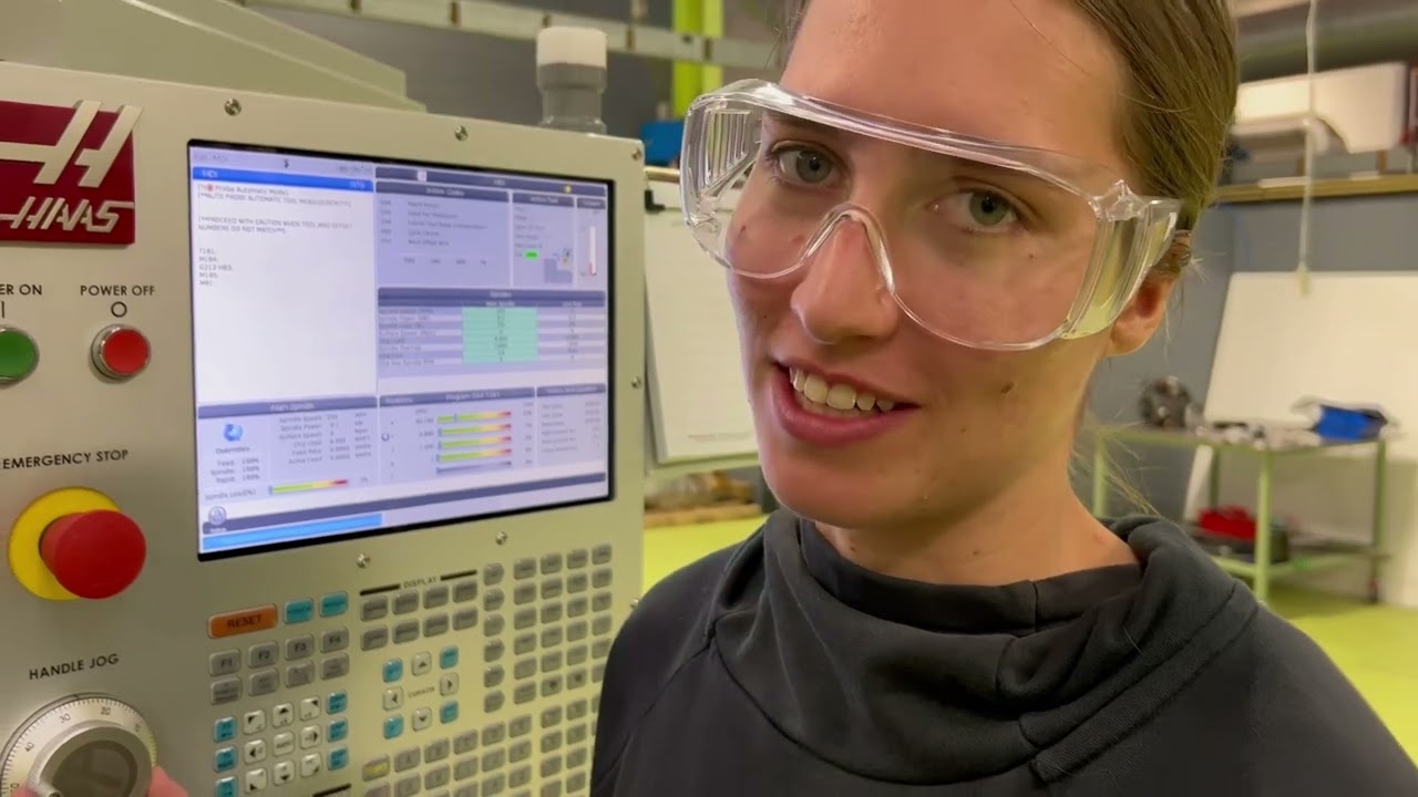 Female apprentice running $120K+ CNC Lathe