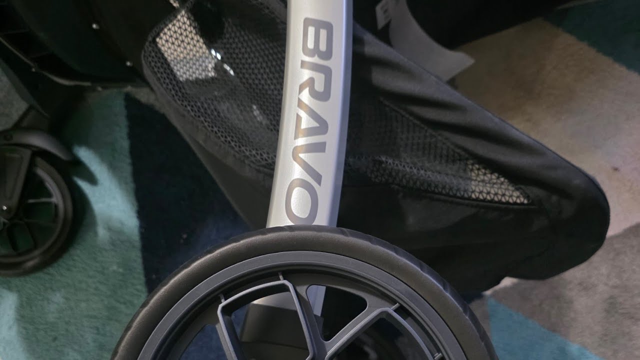 How to install the wheels on the Chicco Bravo stroller and make sure they are secure.