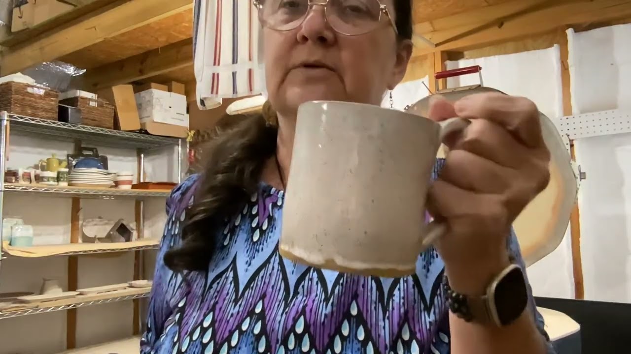 Glaze kiln unloading: charcuterie pans, Christmas ornaments, TN plate. Dianna’s Mud Shop 9/11/25