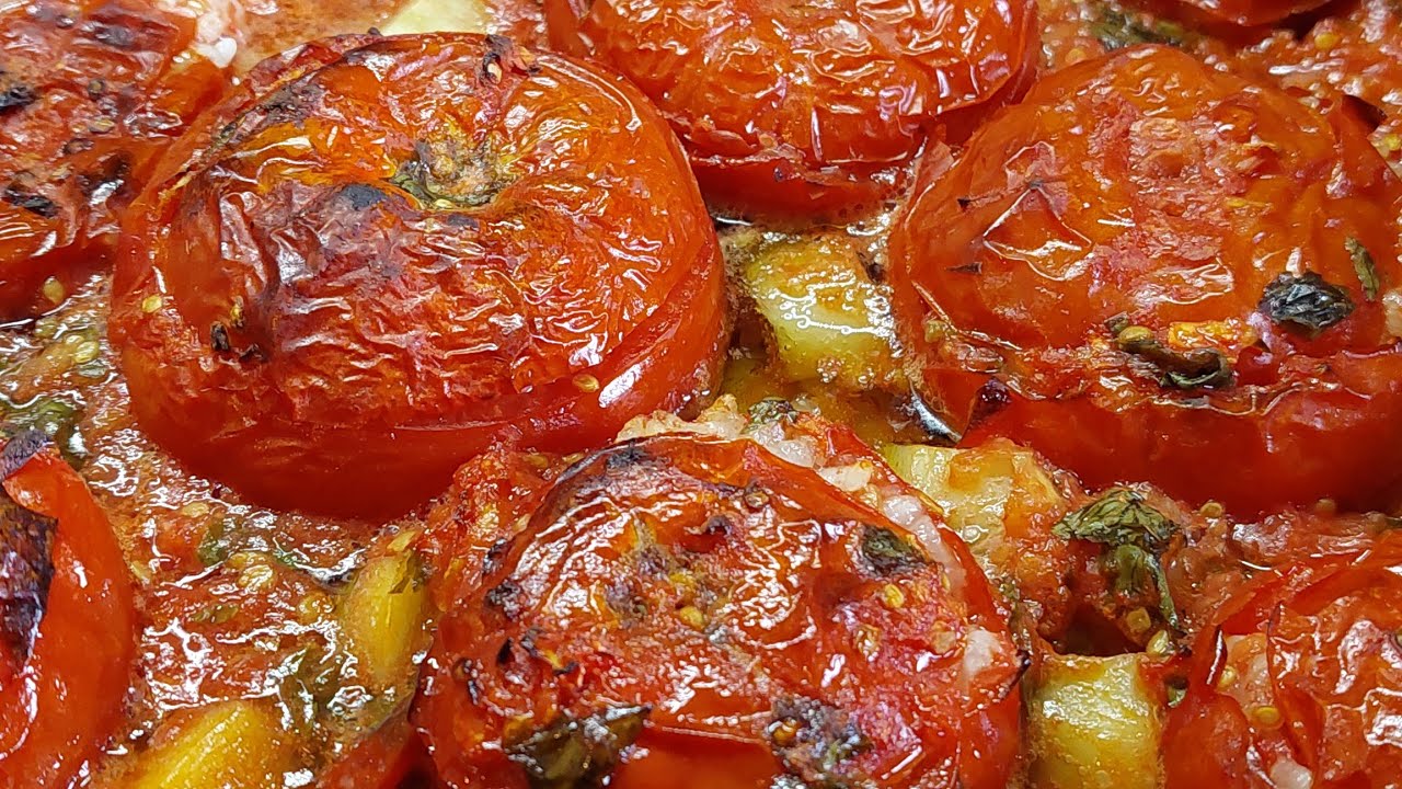 Pomodori ripieni di riso  al forno con patate