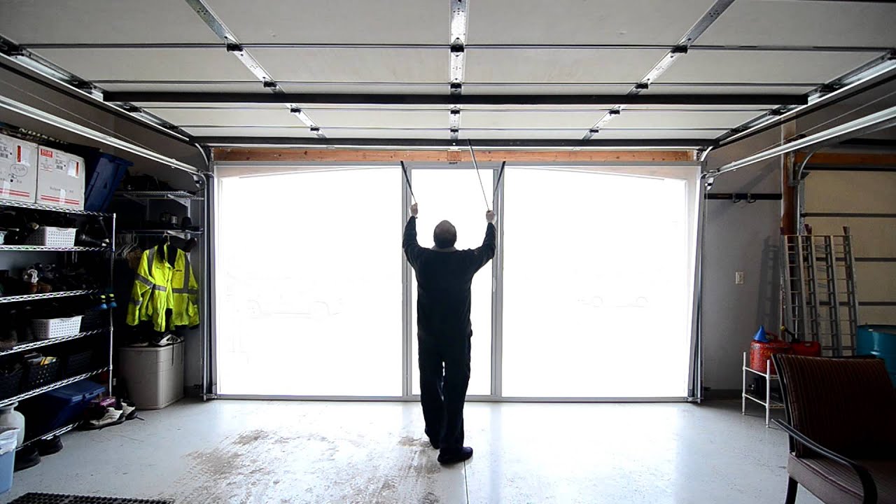 The Lifestyle Garage Screen System installed by Nosbush Glass Co.