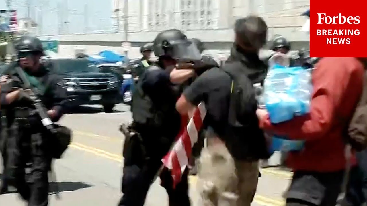 SHOCK MOMENT: Face-Off Between Anti-ICE Demonstrator And LAPD Leads To Physical Confrontation