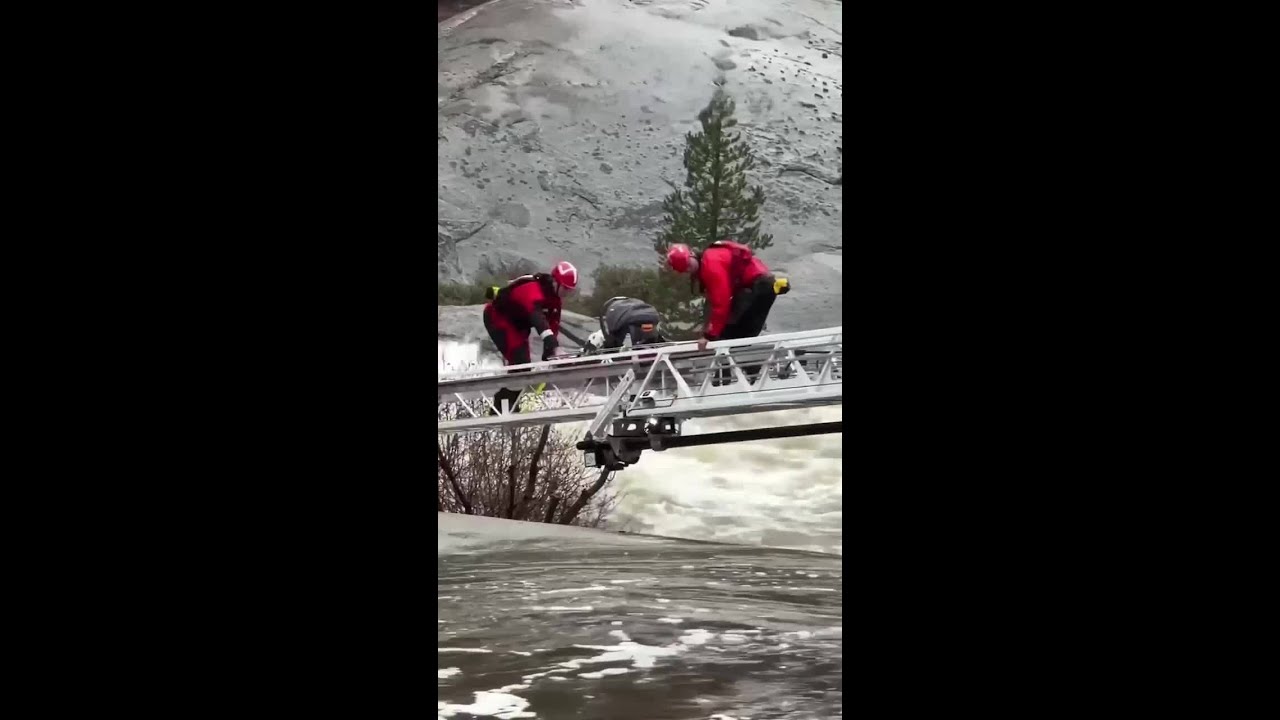 Baby rescued after being stranded by floodwaters