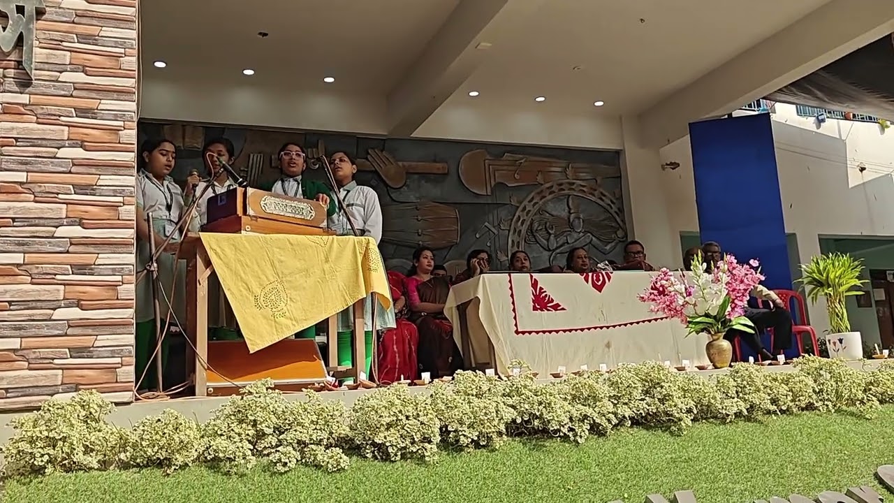 A third singing performance by the students