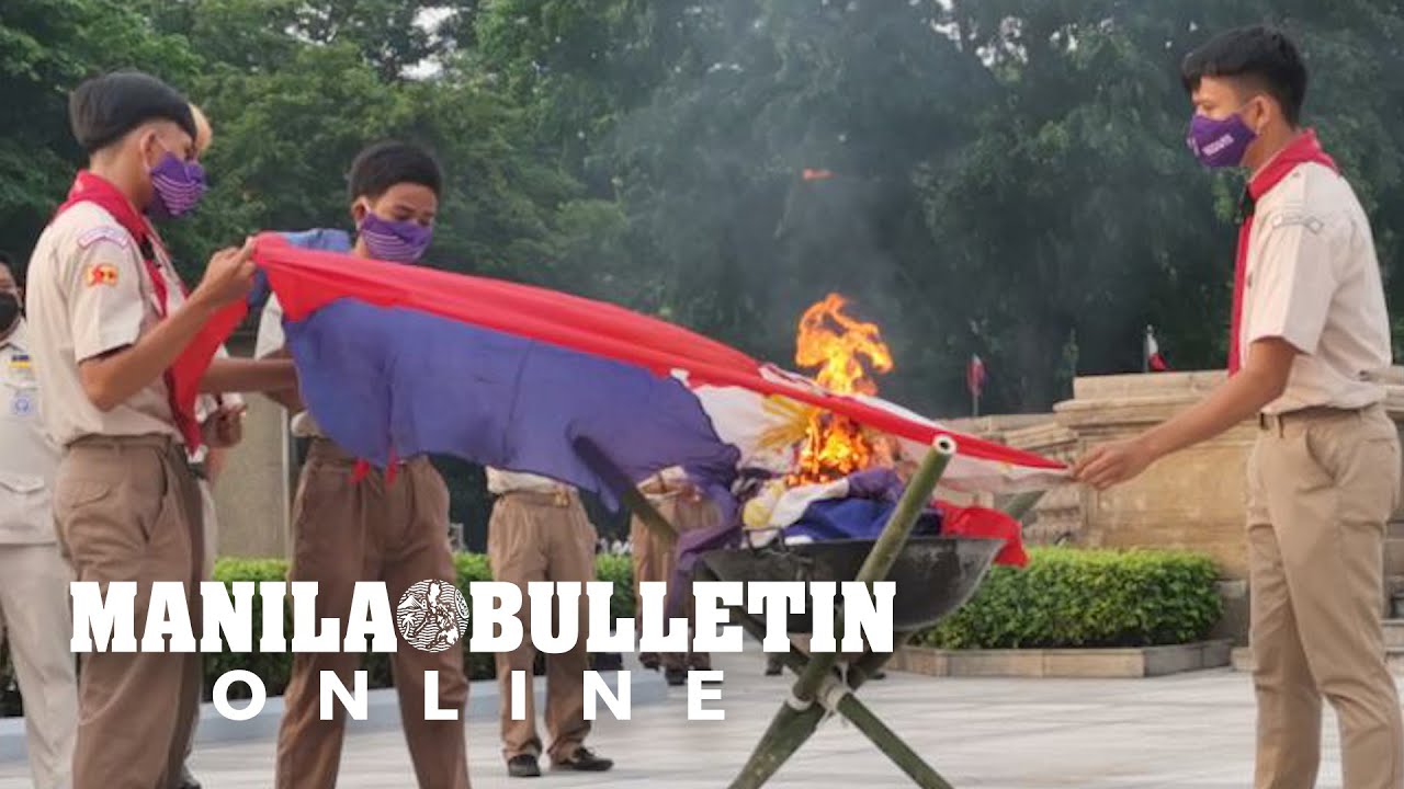 Burning of worn-out flags in front of the Rizal Monument in Luneta Park