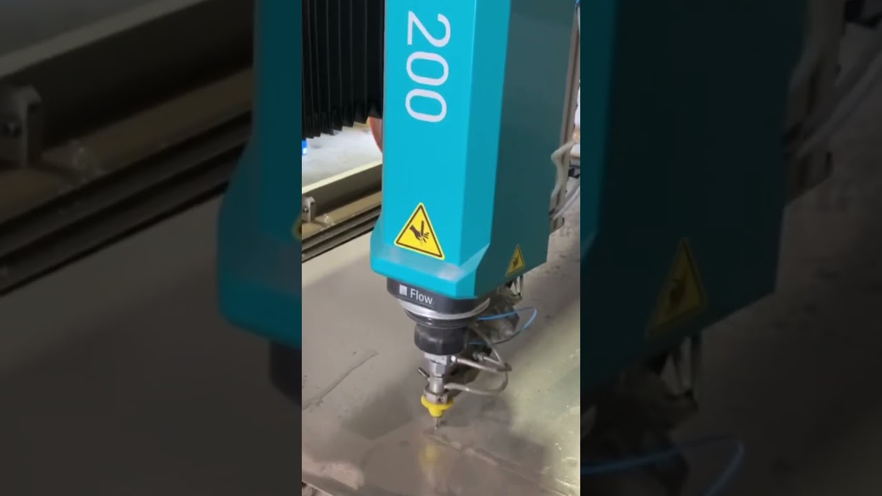 Flow water jet machine in action.