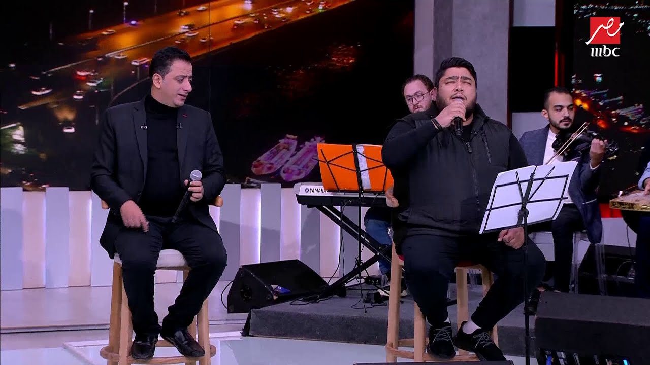 (أنا حي بيك يا شمس الحياة).. انسجام رائع بين الثنائي علي الهلباوي ومايكل رضا