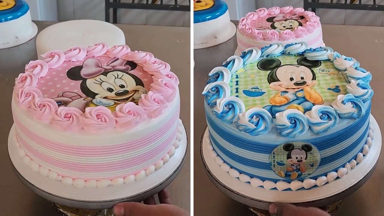 pastel de minnie bebe y Mickey bebe con crema chantilly