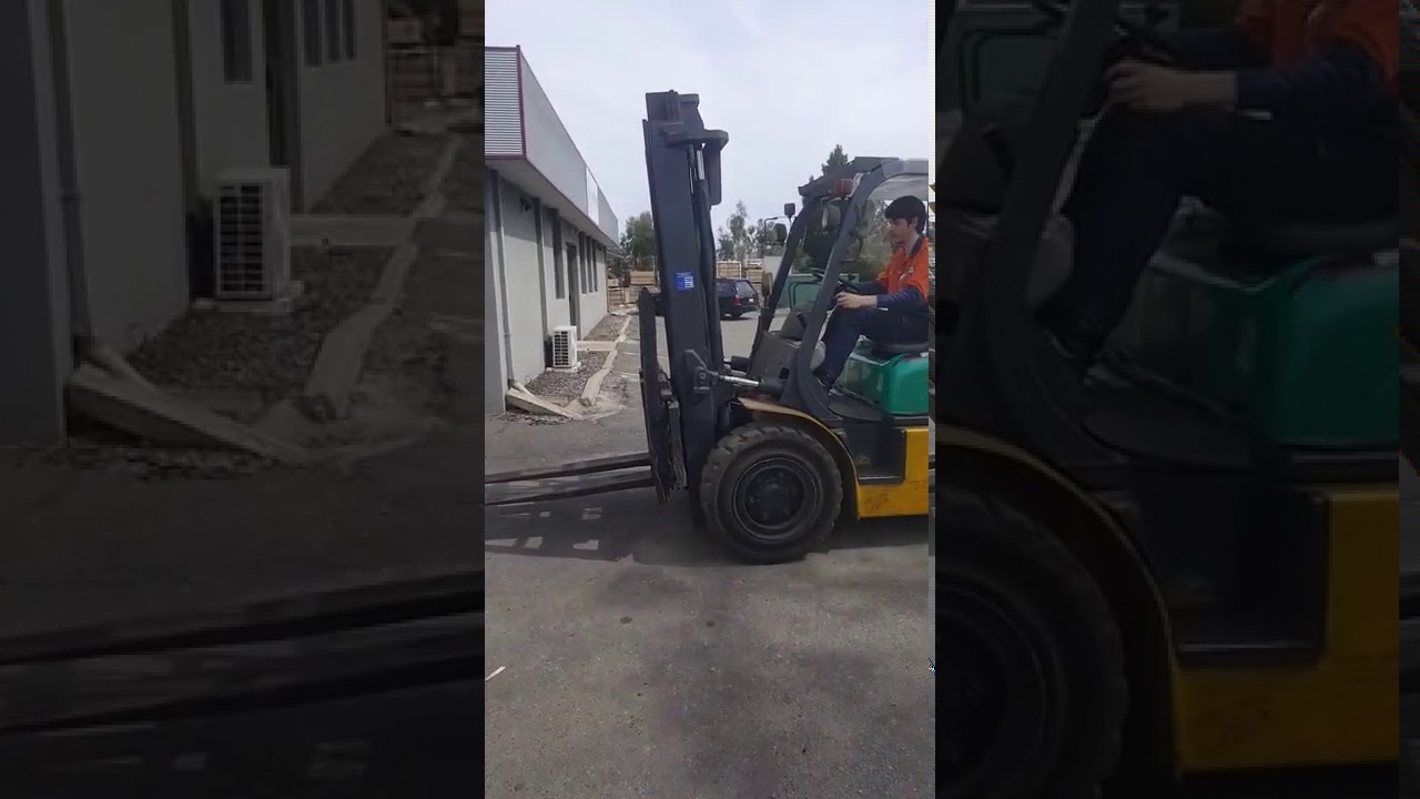 Forklifting wood pallet into UNISEG Container