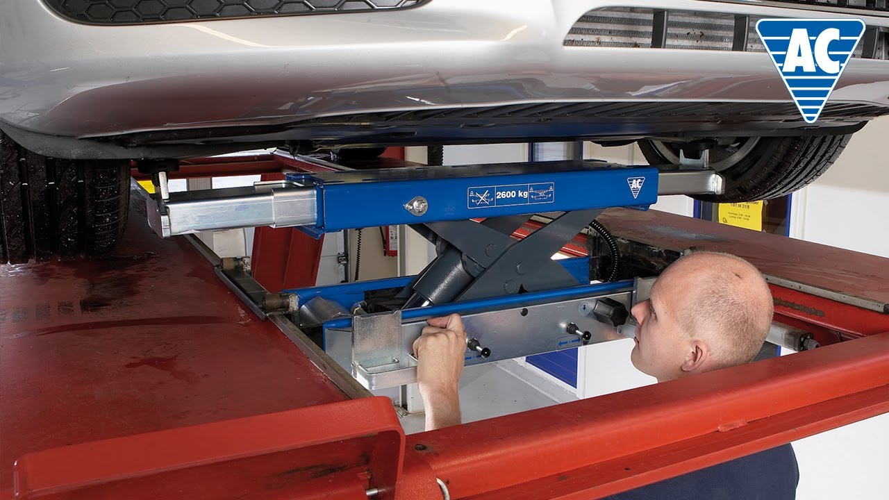 Automatic air hydraulic jacking beam