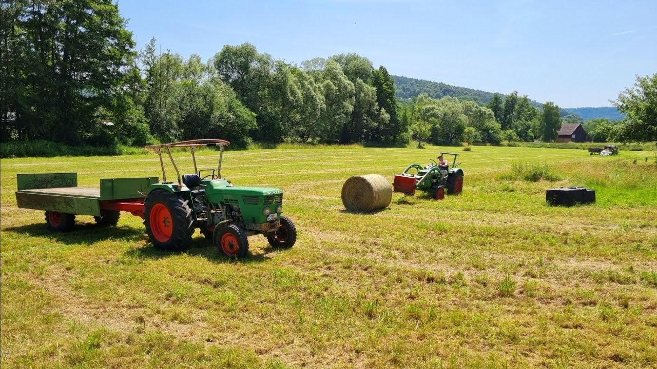 Rundballen holen und Platz abziehen , Deutz 4006 40.2. und MF 3085  