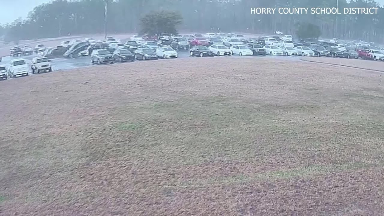 CAUGHT ON CAMERA: Tornado flips cars at South Carolina high school