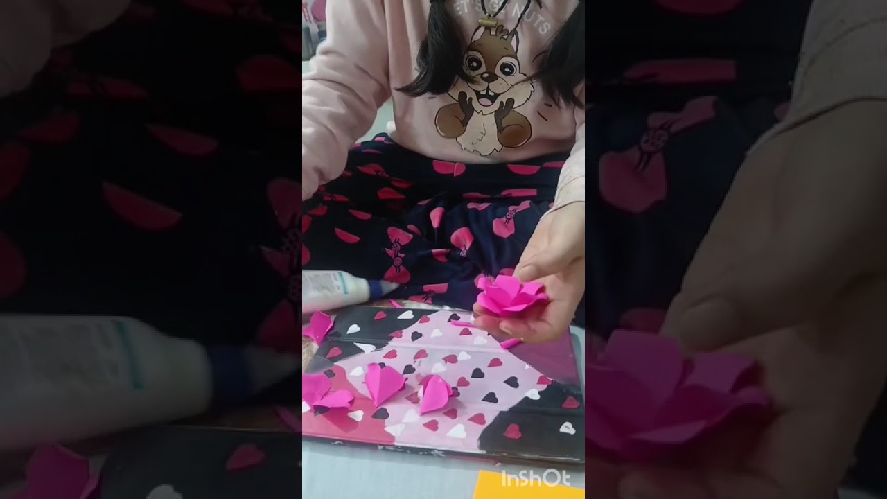 Origami rose flower with vase 