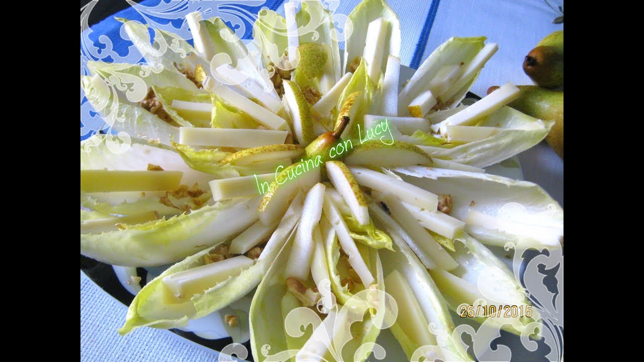 Insalata belga con formaggio,pere e noci.
