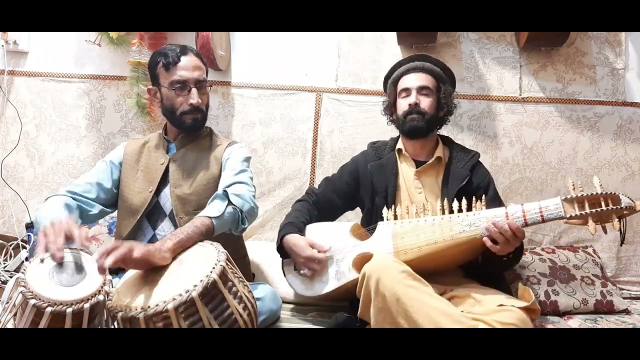 pa gogal danana tol parhar parhar ym..rabab by irfan gulab Tabla player nawshair ustad.