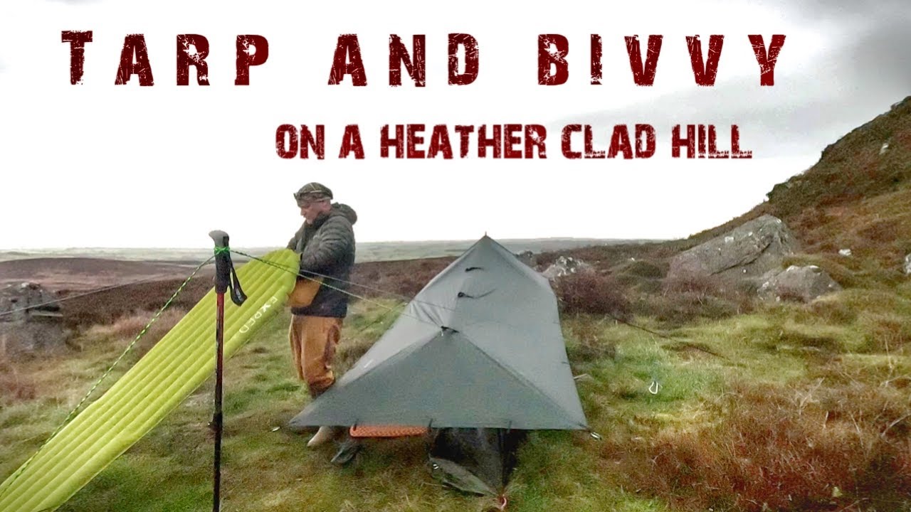 Tarp and Bivy camp on a heather-clad hill, the perfect antidote to work #wildcampinguk