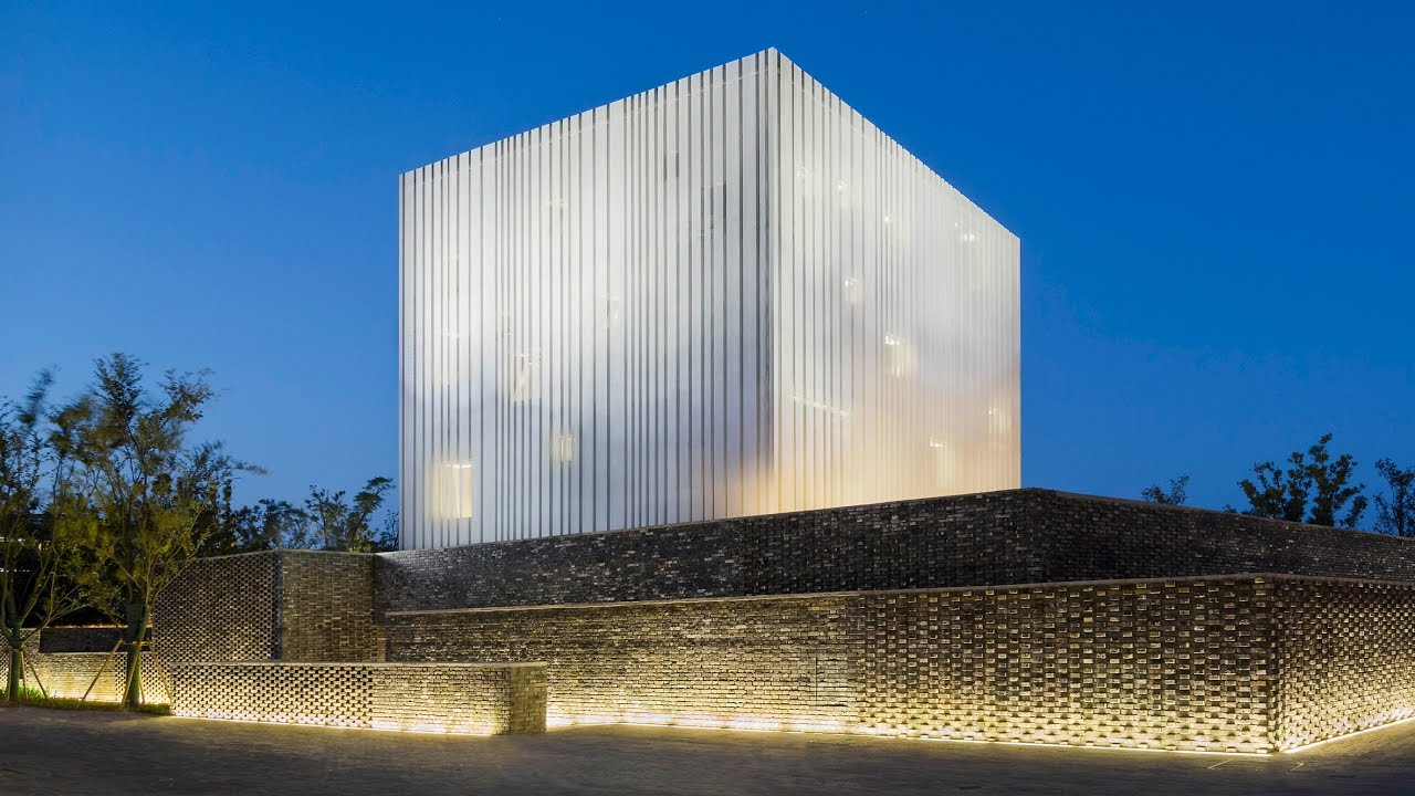Neri & Hu's Suzhou Chapel combines textured brick base with ethereal white cube