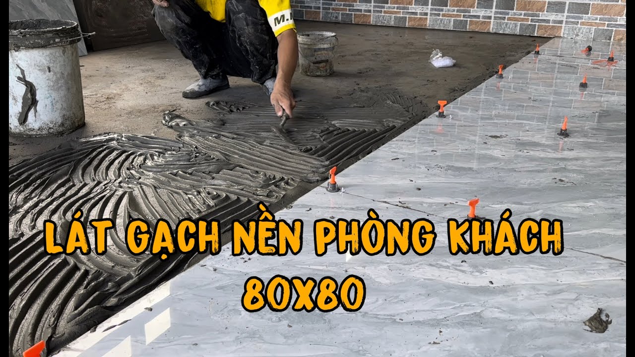 quá trình lát hoàn thành gạch nền phòng khách chuẩn đẹp