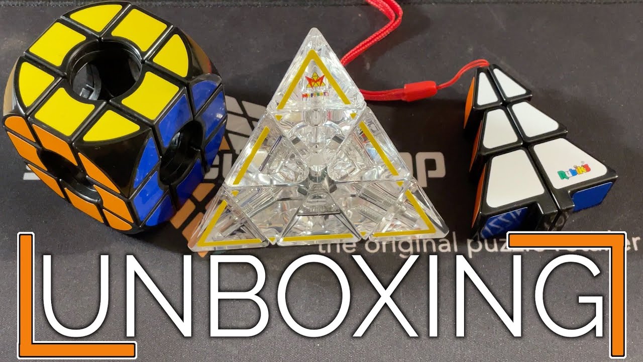 Meffert's 50th Anniversary CRYSTAL Pyraminx, Christmas 1x2x3, Rubik's Void Cube! - Unboxing Puzzles