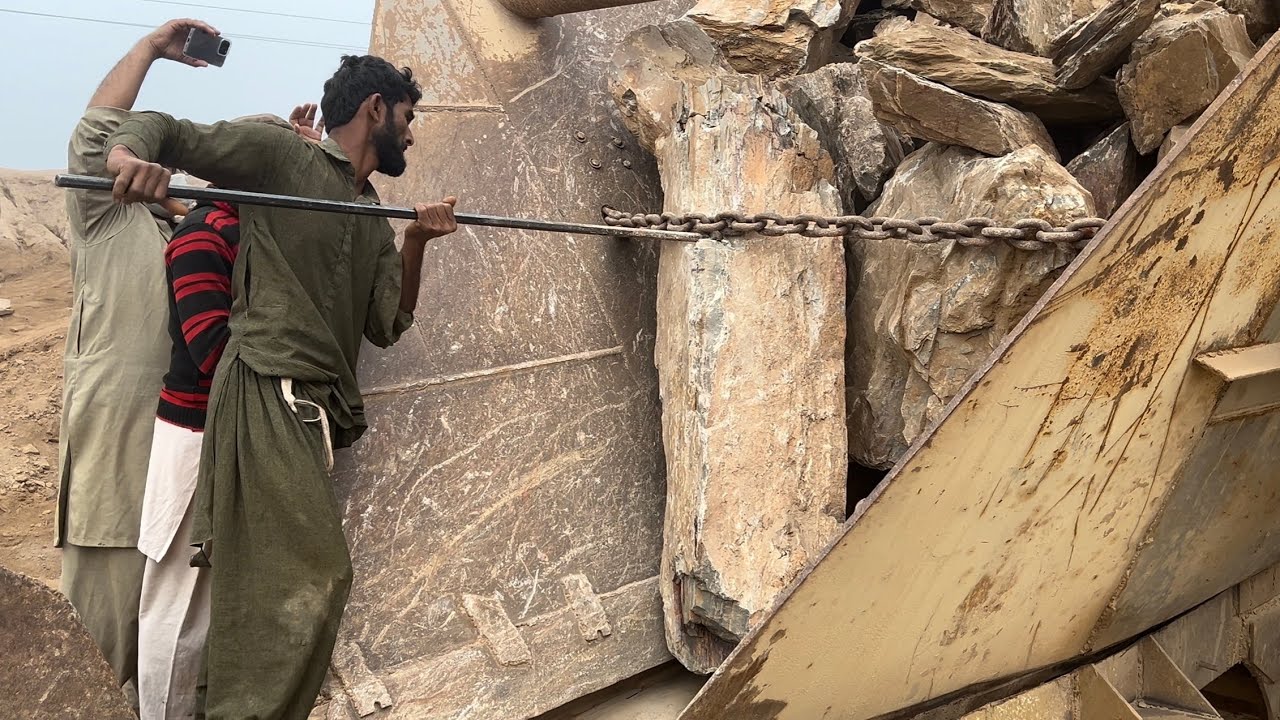 How to break large rocks without Machines?