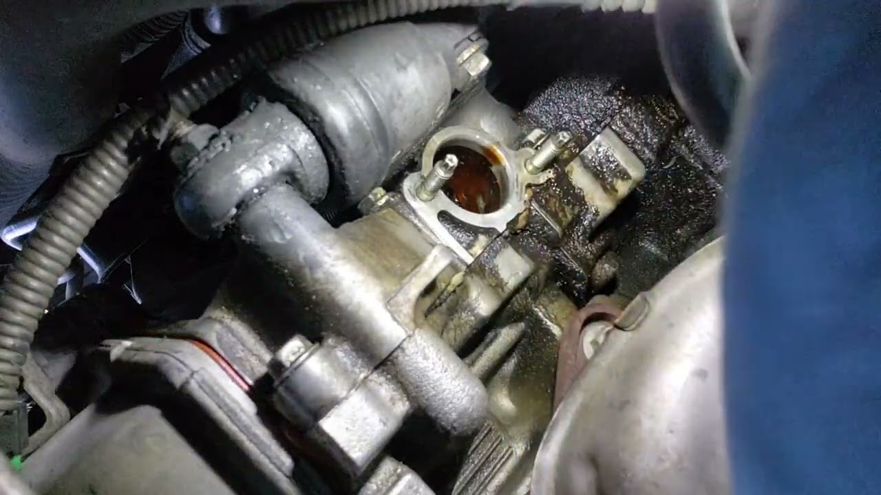 como remplasar el tensor dela cadena del tiempo a toyota corolla 2003 2008How to replace the timing